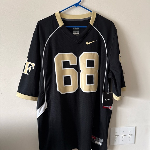 Nike Other - Nike Black and Gold Men's Jersey